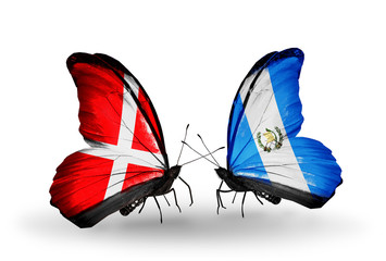 Two butterflies with flags Denmark and Guatemala