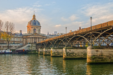 Fototapeta premium Seine river and Old Town of Paris (France) in the sunrise