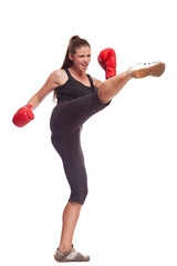 sport young woman with red gloves going to fighting