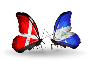Two butterflies with flags Denmark and Nicaragua