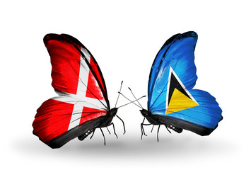 Two butterflies with flags  Denmark and Saint Lucia