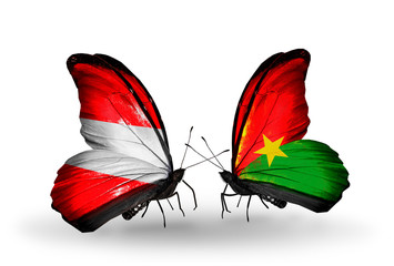Two butterflies with flags Austria and Burkina Faso