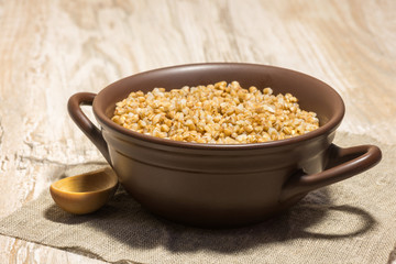 buckwheat cereal wooden spoon