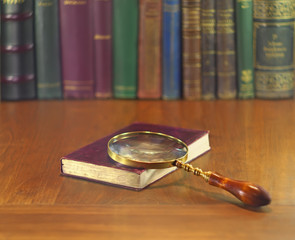 magnifier and book