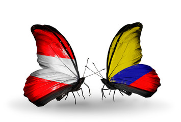 Two butterflies with flags Austria and Columbia