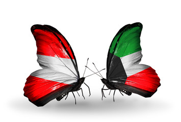 Two butterflies with flags Austria and Kuwait
