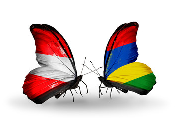 Two butterflies with flags Austria and Mauritius