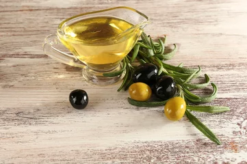 Foto op Plexiglas Green and black olives with branch near the saucepan © Africa Studio