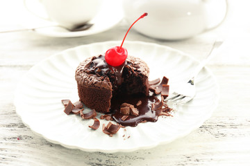 Hot chocolate pudding with fondant centre on plate, close-up