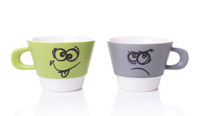 Emotional cups isolated on white