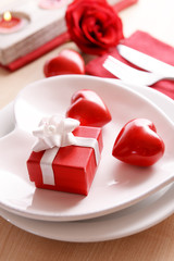 Festive table setting for Valentines Day on table background
