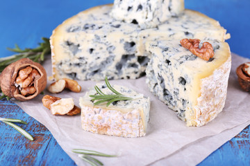 Blue cheese with sprigs of rosemary and nuts