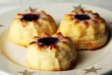 Delicious cheesecakes on plate, close up