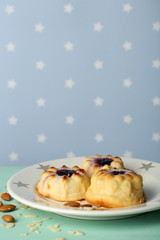 Delicious cheesecake on table, on color background