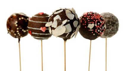 Tasty cake pops, isolated on white