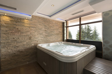 Jacuzzi bath in hotel spa center 