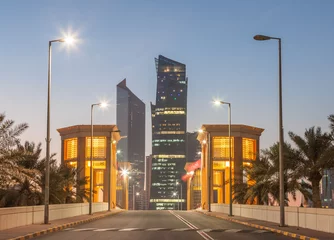 Fotobehang Architecture in Kuwait City illuminated at dusk © philipus