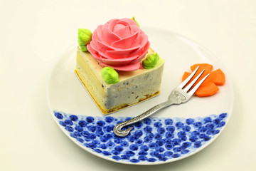 A Cream Cake on a Plate with a Fork