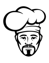 Hispanic chef in a white toque