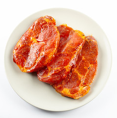 Pork neck slices on a plate © Xalanx