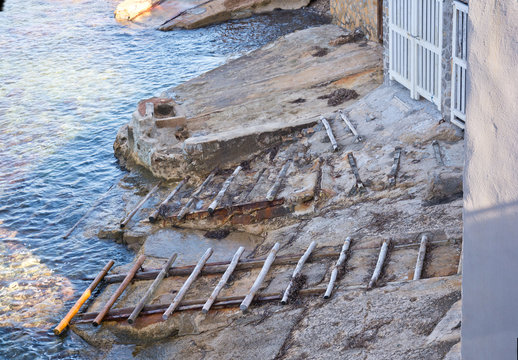 Wooden boat rails. Sant Elm, San Telmo, Mallorca, Spain.