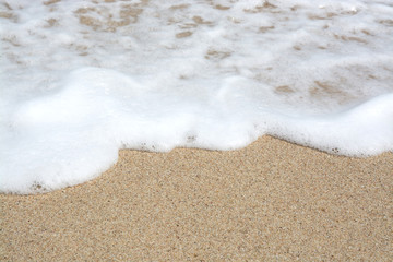 Sand and seafoam