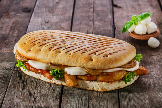 Fototapeta grilled sandwich with chicken and mozzarella cheese
