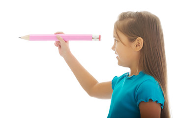 Little girl with a pencil