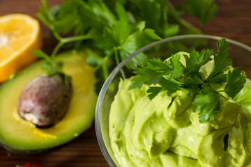 Guacamole on wooden table