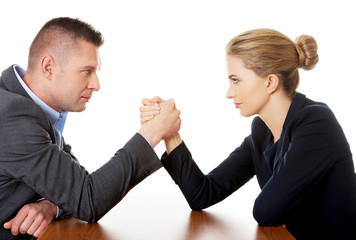 Businesspeople fighting on hands