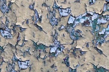 cracked paint on an old metal wall