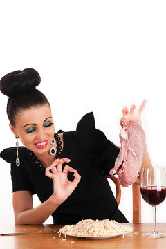 Luxury Woman With Disgust Holding A Piece Of Raw Meat