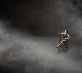 Fototapeta premium nice girl posing with long black dress