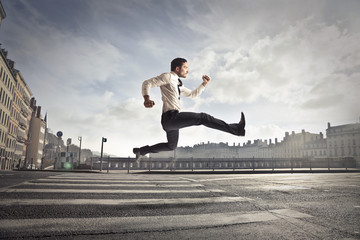 Fototapeta na wymiar Businessman jumping