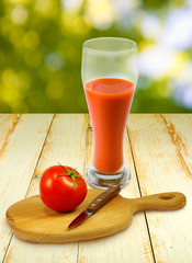tomatoes and tomato juice on the table