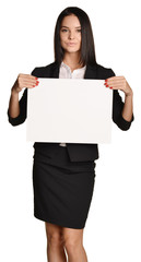 Business woman holding in hand a blank sheet of white cardboard