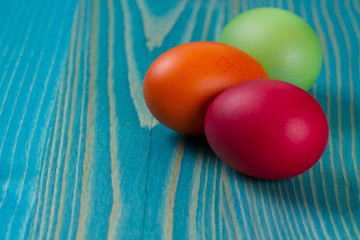 Easter eggs an  wooden platte