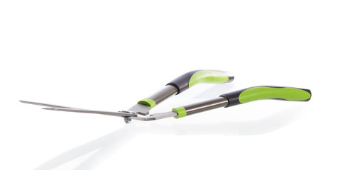 Scissors to cut grass isolated