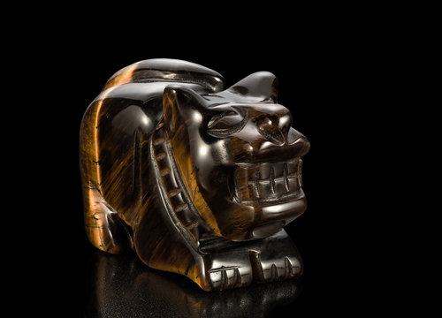 Hand carved tiger figurine from tiger eye stone