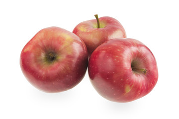 Three red apples on a white background