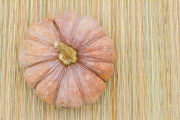 Still Life pumpkin on traditional mat