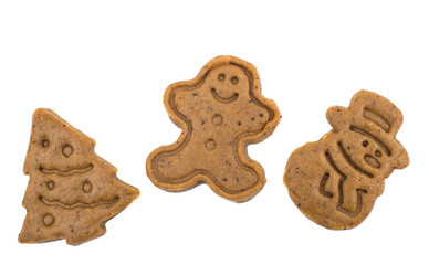 Gingerbread dough for Christmas cookies and cookie cutters.