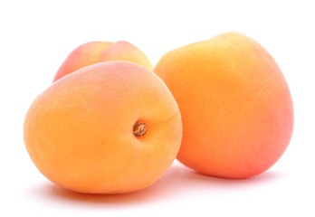 Apricots isolated on white background