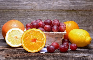 Assortment of fruits on a wooden background