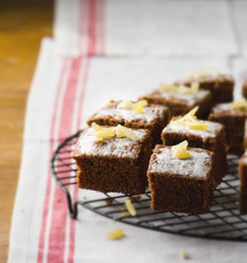 slices of a ginger parkin on a lattice for cooling.