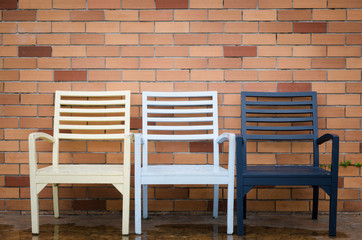 Chair and brick wall