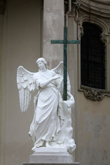 Angel statue in front of Karlskirche in Vienna