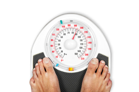 Standing On Weighing Scales Stock Photo - Download Image Now