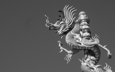 Dragon statue in temple on black and white