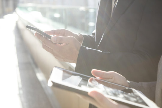 Hand of businessman that have electronic terminal